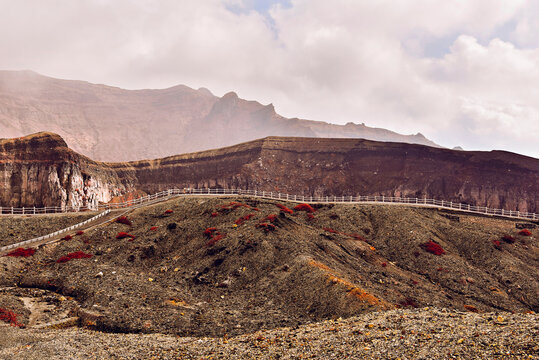 Mt Aso landscape with paths and volcanic terrain in grunge color scheme in Kumamoto Prefecture, Kyushu, Japan