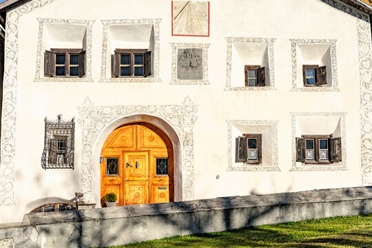 Old facade with sundial mural, Guarda, Engadin, Graubunden, Switzerland