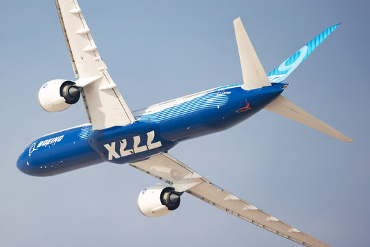 Boeing 777-9 (N779XW) flying over Al Maktoum International Airport on November 17, 2025 in Dubai, UAE