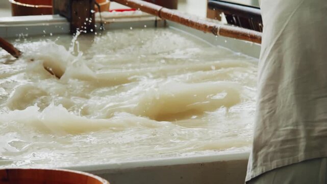  Xuan Paper Making - Mixing Pulp in Vat 4K