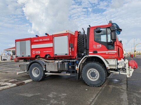 Ostia, Rome, Italy - August 21, 2026, operational firefighter vehicle ready to respond, parked on the seafront.