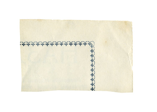 Vintage torn piece of aged book page texture. Old antique ripped sheet paper isolated.	