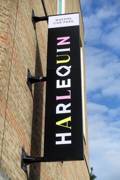 Sign for the Queen's Car Park at Harlequin Watford. A premier indoor shopping, retail, and entertainment destination located right in the heart of Watford town centre, Hertfordshire.