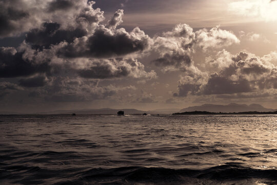 Golden Hour Sky and Calm Ocean Waters at Sunset in Morrocoy National Park, Falcon State, Venezuela