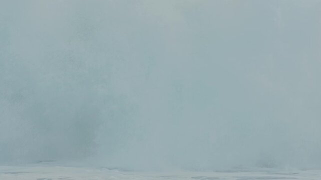Powerful turquoise ocean wave breaking and splashing in slow motion in puerto escondido, mexico