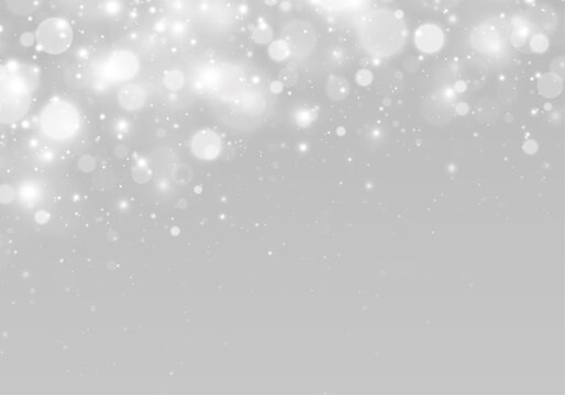 Bright bokeh lights with glitter particles and luminous sparkle.