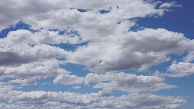Blue Sky and Puffy Clouds Timelapse Background