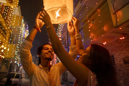 Celebration of Festival With Sky Lanterns in a Decorated Street
