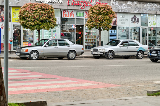 Two silver Mercedes-Benz classic cars&mdash;a W201 190E and a W202 C-Class&mdash;in Telavi; classic German &ldquo;youngtimers&rdquo; and classic cars from the 1980s and 1990s, Kakheti region, Georgia 11.04.25