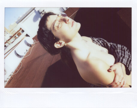 UGC Polaroid ofSunlit rooftop relaxation