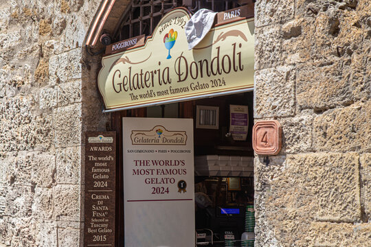 San Gimignano SI, Tuscany, Italy - May 24, 2026: Piazza Della Cisterna, Gelateria Dondoli, the most famous gelato in the world in 2024.