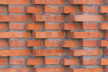 Fototapeta premium Weathered Orange Brick Wall Texture