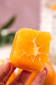 Fresh Orange Segment with Juice Droplets - Citrus Fruit Close-up for Healthy Living