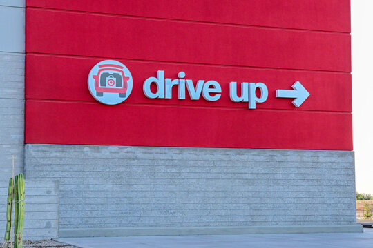 Target store sign directing customers to the Drive Up pickup area, illustrating curbside service, online ordering, retail convenience, and omnichannel shopping