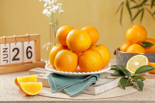 Fresh Orange Citrus Fruits Still Life Arrangement with June 26 Calendar Summer Kitchen Decor