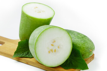 Fresh Yunnan Winter Melon Slices - Small Jade Green Asian Vegetable on Wooden Board © LamHuong