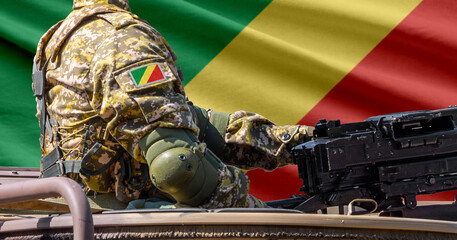 Fototapeta premium Congo flag with soldier at machinegun turret