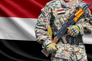 Fototapeta premium Egypt flag with soldier holding assault rifle