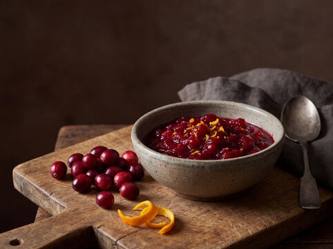 Bowl of homemade cranberry sauce with fresh orange zest