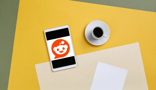 Tablet displaying reddit logo for social media platform and digital community showcase.
