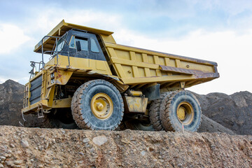 Heavy mining dump truck transporting earth material © JuanFrancisco