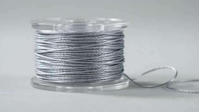 Silver Thread on Clear Spool Ideal for Sewing and Craft Projects