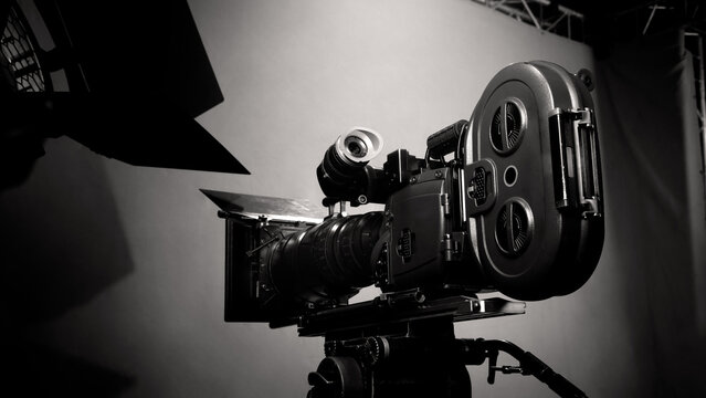 Behind the scenes. BTS of TV commercial movie film or video shooting production which pro camera crew setting up on green screen for chroma key technique in studio. Greenscreen background shooting set