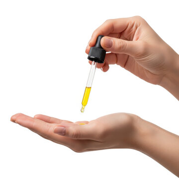 Person dispensing liquid from a small dropper bottle isolated on white background