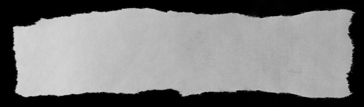 Torn paper on black
