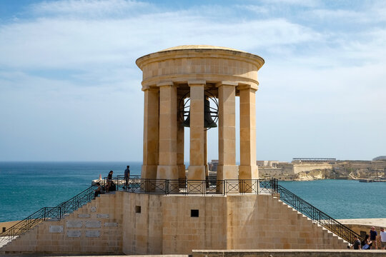 Domed monument with stone columns overlooking the sea, Malta