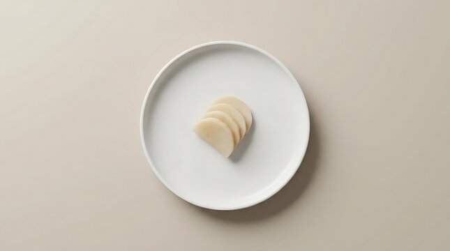 A minimalist overhead shot of delicious kabu amazuzuke or Japanese pickled turnip slices neatly arranged on a clean white ceramic plate for serving