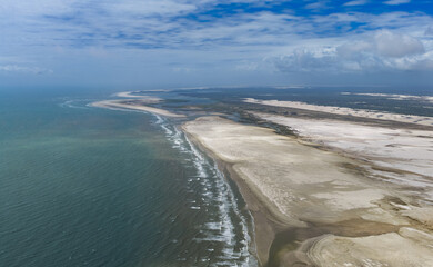 Fototapeta premium Atlantic Waves Break Along Sand Flats, Atins, Maranhão