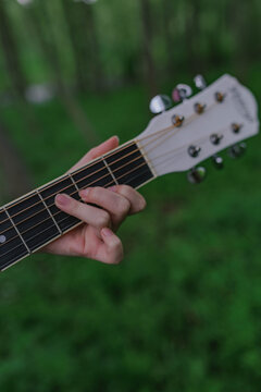 man playing guitar