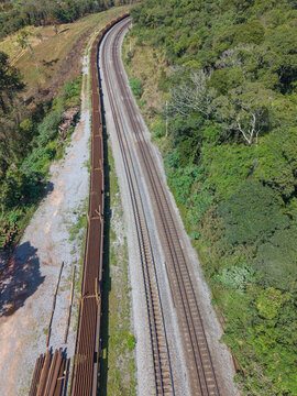 Aerial view of a cargo train and rail roads