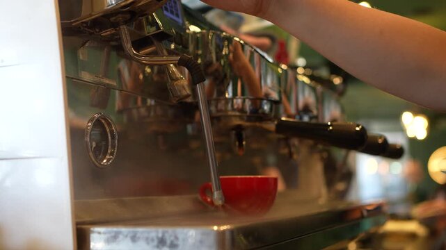 Coffee machine releasing hot water