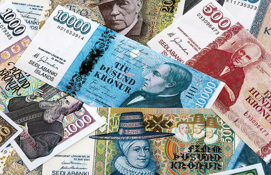 Icelandic krona money banknotes pile on table. Iceland bills of ISK currency. Concept of economy