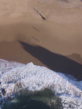 Aerial view, person on the beach Praia da Ursa from above, Ulgueira, Portugal