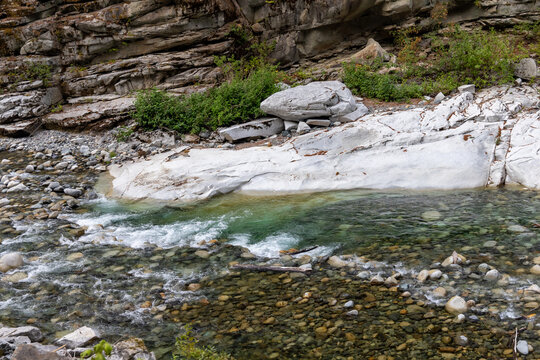 Clear Mountain River Flowing Over Smooth White Rock at Othello Tunnels Near Hope, BC Canada