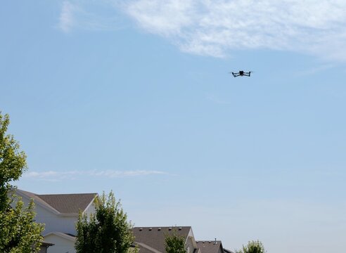 Surveillance drone automated license plate reader cameras patrol local home owners association - safety security personal privacy right 4th amendment