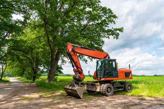 Heavy industrial machines. Excavator. Heavy equipment of excavator with hydraulic system. Excavator heavy machinery. Industrial heavy equipment. Excavator machinery in field