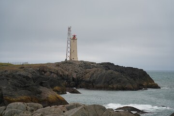 Stokksnes Lighthouse stands close to the spectacular Stokksnes beach and mountains. © Mariusz