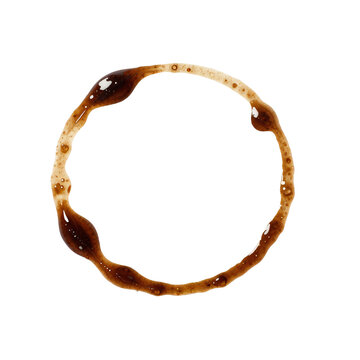 Circle stain from a coffee cup on a white surface with some bubbles
