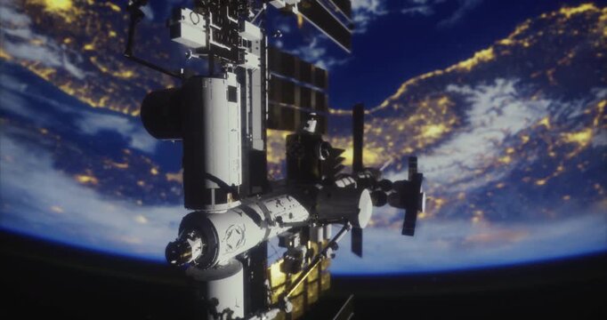 The International Space Station is positioned above Earth, illuminated by city lights below against the dark backdrop of space. The activity showcases human presence in low Earth orbit.