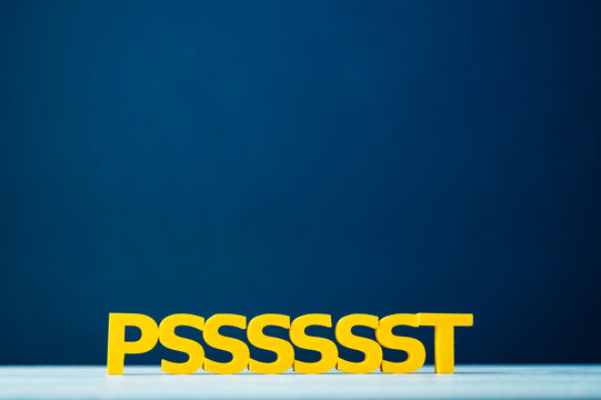 Psst secret and confidential communication concept with yellow letters