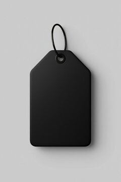 Price tag black blank hanging on gray background for retail labeling, discounts, products, branding, and store displays.