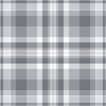 Traditional tartan plaid pattern with a textured woven appearance and antique steel and gray quill tones. The seamless fabric design creates a calm decorative background. for creative surface design.