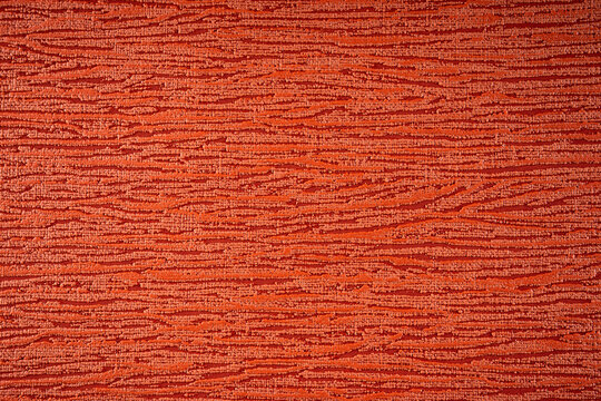 orange fabric background with wood texture