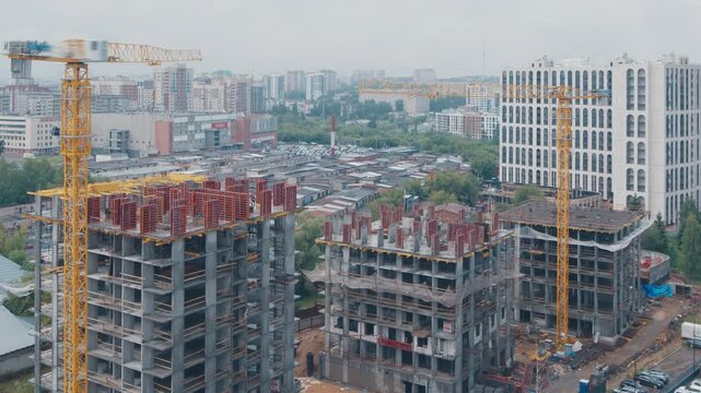 Timelapse of the constriction site of the living building in the city during rainy day