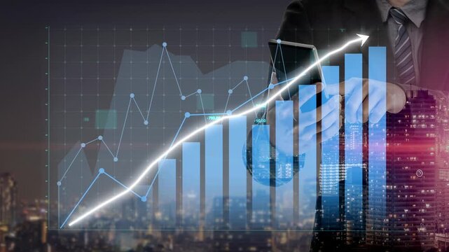 A businessman reviews growth data displayed on financial graphs and charts, set against a vibrant night skyline, ideal for corporate marketing and analysis. Copula