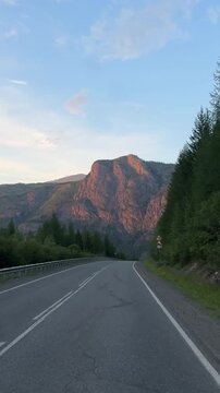 Chuysky Tract at Sunset Seen Through a Car Windshield